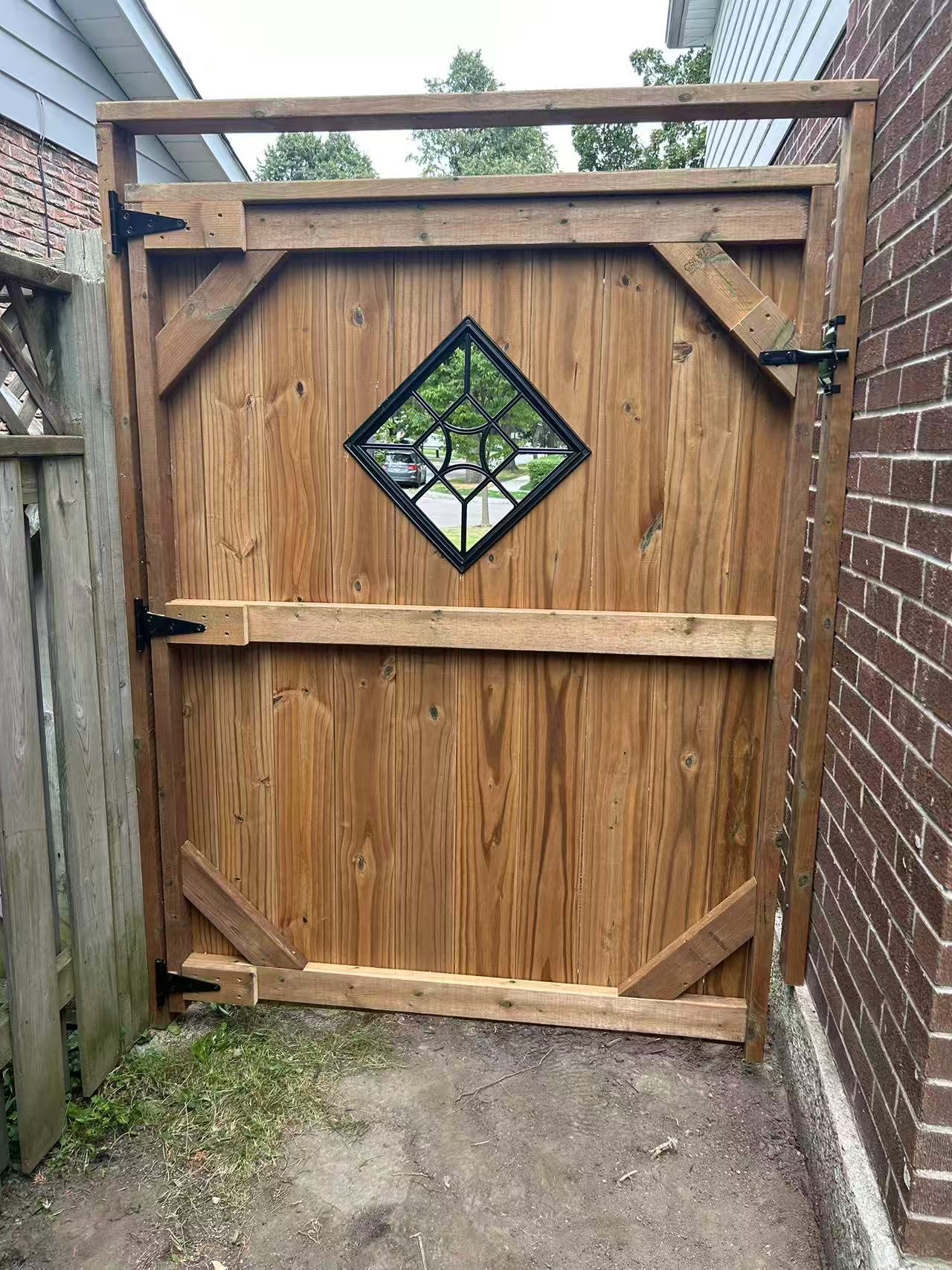Custom cedar gate with diamond glass window insert